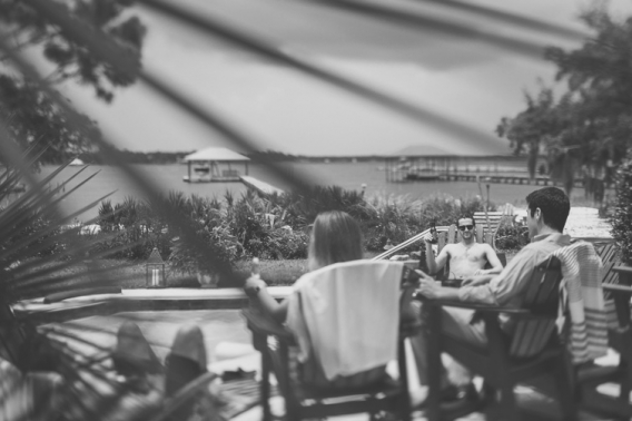 groomsmen hanging out by pool